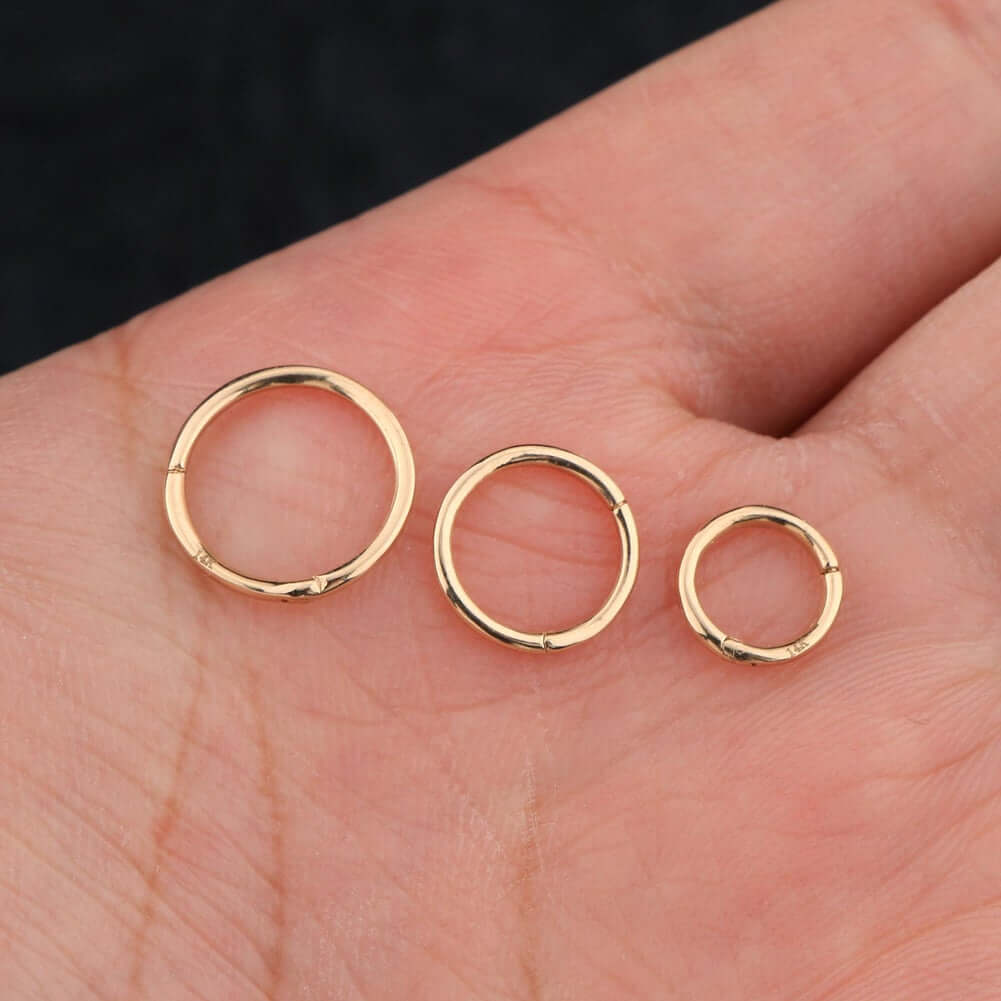 14 kt. yellow gold nose ring with bar